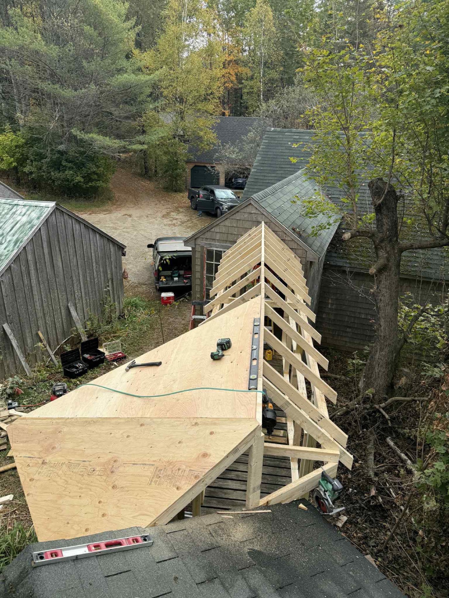 Framing of a new home addition with plywood decking